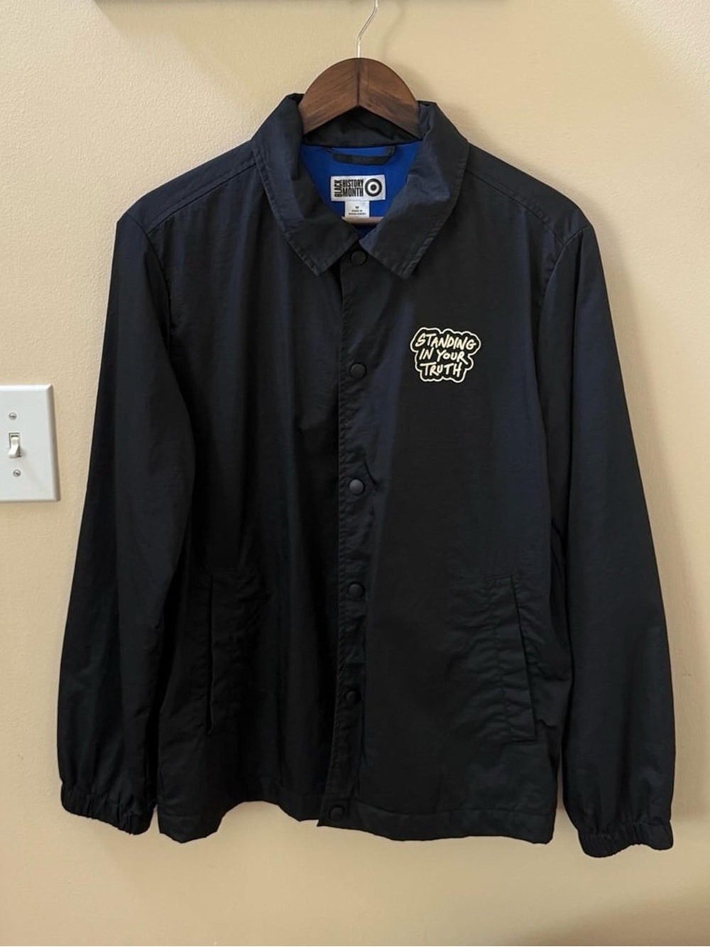 Target Men's Black History Month Coach Jacket with White Graphic Design
